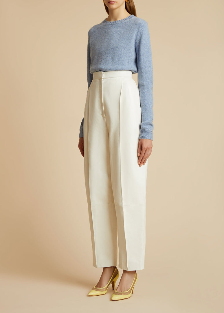 딜레타 스웨터 폴라